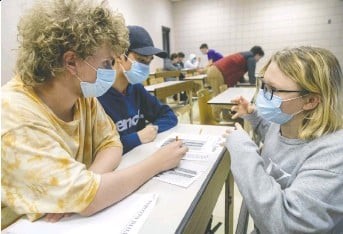 Image of high school students Jake Edwards (left) and Evin Long 